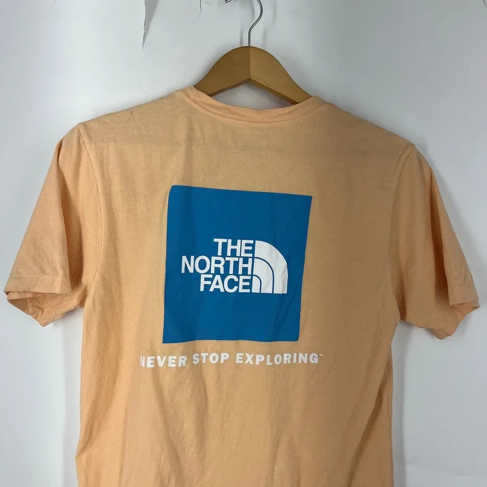 The North Face Mens Peach Graphic Short Sleeve T-Shirt Blue Box Logo Size‎ S